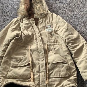 Selling a nice warm jacket that no longer fits.